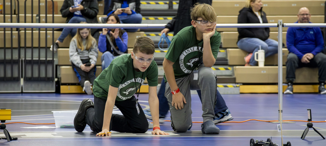 Middle School - East Science Olympiad students during their Wheeled Vehicle event.